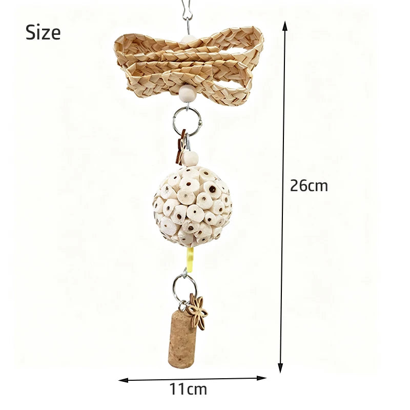 A hanging bird toy made of woven natural fiber, a white beaded ball with eyelets, and a cork plug, shown on a white background with dimension labels indicating 26 cm height and 11 cm width.