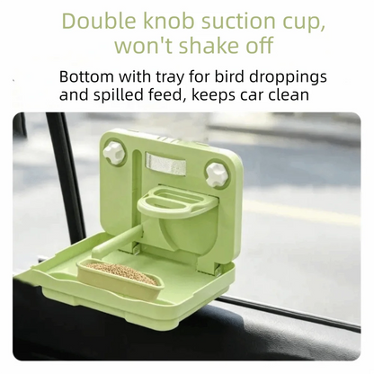 A light green double-knob bird feeder with a tray for bird droppings and spilled feed, mounted on a car window. The image includes text at the top explaining its benefits.