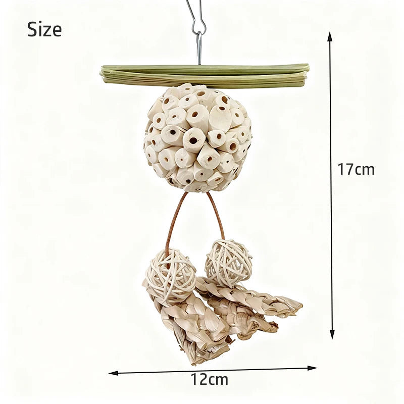 Decorative hanging sola ball with natural elements and measurements on a white background