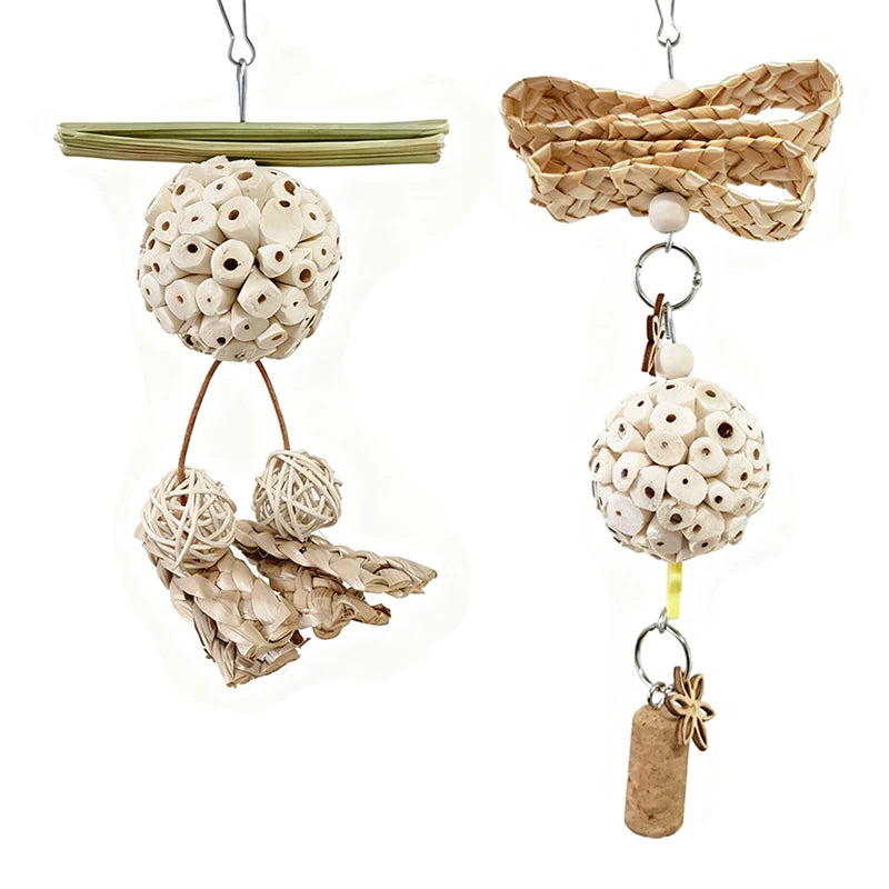 Bird toy with rattan balls, and cork piece on a white background